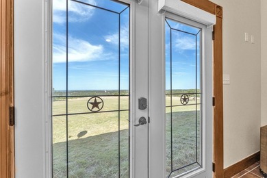 Bring your horses and gear to this scenic Hill Country retreat