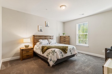 Welcome to Queens Harbour! This move-in ready 2-bedroom, 2-bath