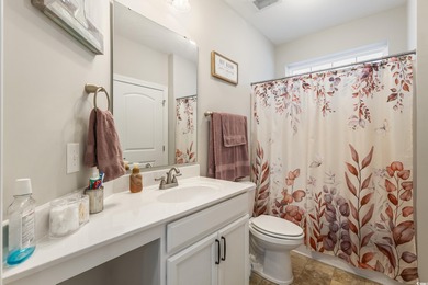 Welcome to Queens Harbour! This move-in ready 2-bedroom, 2-bath