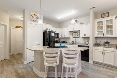 Welcome to Queens Harbour! This move-in ready 2-bedroom, 2-bath