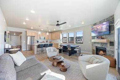 Experience elevated mountain living in this 2025 three-bedroom