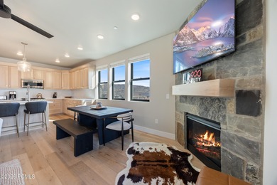 Experience elevated mountain living in this 2025 three-bedroom