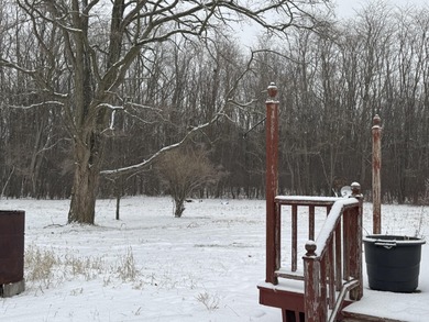 This lovely modular home on 3 acres of private land is a nice