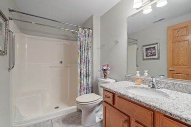 BEAUTIFULLY MAINTAINED LUXURIOUS FIRST FLOOR CONDO, ATTACHED