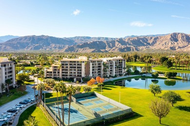 Perched above the shimmering lake and emerald fairways, 899