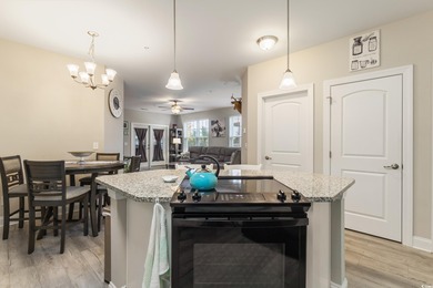 Welcome to Queens Harbour! This move-in ready 2-bedroom, 2-bath