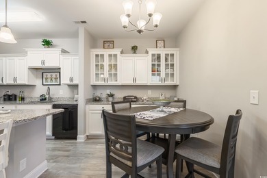 Welcome to Queens Harbour! This move-in ready 2-bedroom, 2-bath