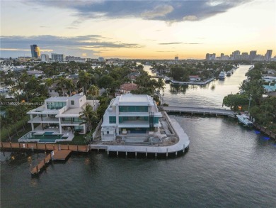 Set on a coveted point lot in the exclusive Harbor Beach enclave