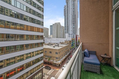 Stylish and spacious bi-level loft-style condo in the exclusive