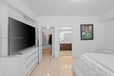 Stylish and spacious bi-level loft-style condo in the exclusive