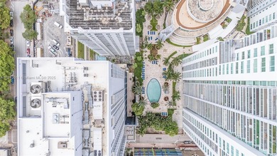 Stylish and spacious bi-level loft-style condo in the exclusive