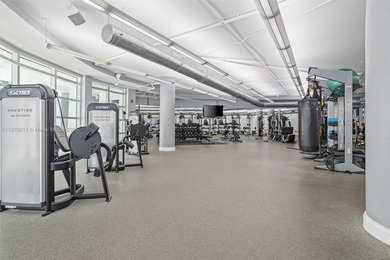 Stylish and spacious bi-level loft-style condo in the exclusive