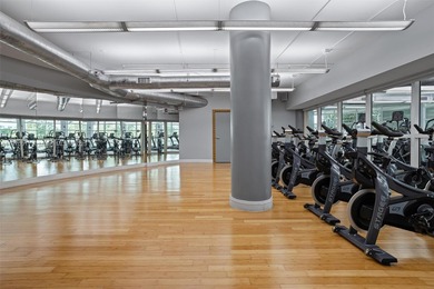 Stylish and spacious bi-level loft-style condo in the exclusive