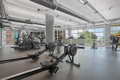 Stylish and spacious bi-level loft-style condo in the exclusive