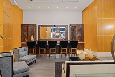 Stylish and spacious bi-level loft-style condo in the exclusive