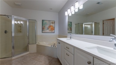 Waterfront luxury at Summer Place in Camdenton! This beautifully