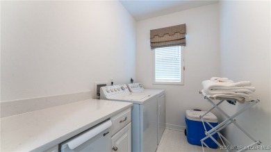 Waterfront luxury at Summer Place in Camdenton! This beautifully