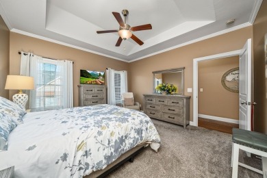 Embrace maintenance-free living in this beautiful end-unit