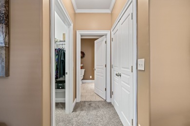 Embrace maintenance-free living in this beautiful end-unit