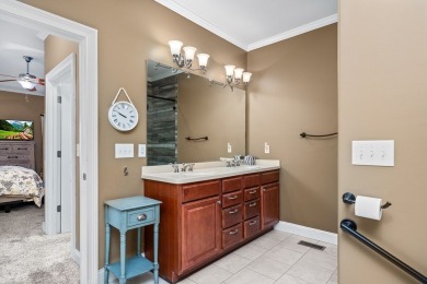 Embrace maintenance-free living in this beautiful end-unit