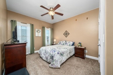 Embrace maintenance-free living in this beautiful end-unit