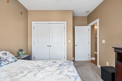 Embrace maintenance-free living in this beautiful end-unit