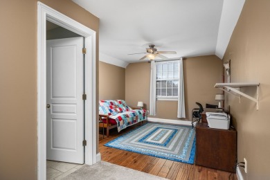 Embrace maintenance-free living in this beautiful end-unit