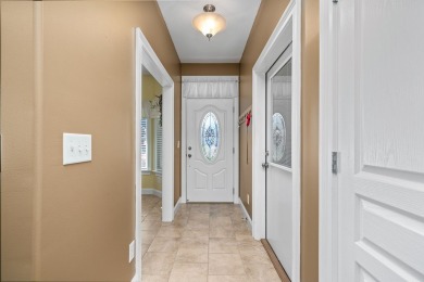 Embrace maintenance-free living in this beautiful end-unit