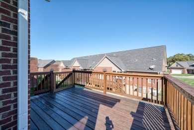 Embrace maintenance-free living in this beautiful end-unit