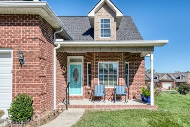 Embrace maintenance-free living in this beautiful end-unit