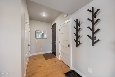 Experience elevated mountain living in this 2025 three-bedroom