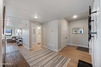 Experience elevated mountain living in this 2025 three-bedroom