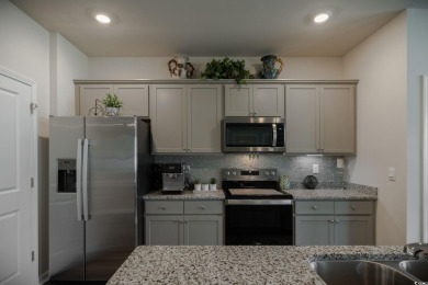 Welcome to move-in ready coastal comfort at 171 Cassina Dr.!