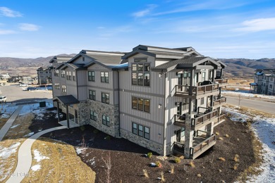 Experience elevated mountain living in this 2025 three-bedroom