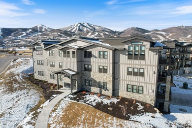 Experience elevated mountain living in this 2025 three-bedroom