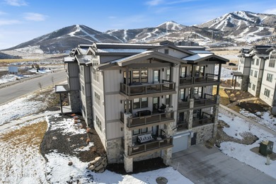 Experience elevated mountain living in this 2025 three-bedroom