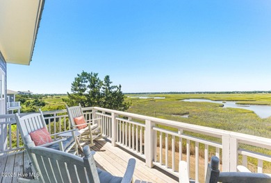 Enjoy coastal living at its finest on Figure Eight, an exclusive