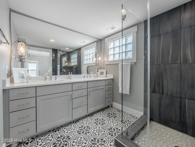 Enjoy coastal living at its finest on Figure Eight, an exclusive