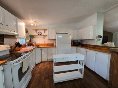 Spacious and comfortable 3-bedroom, 2-bath home on over half an