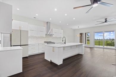 Experience coastal living at its finest in this exceptional and