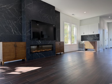 Experience coastal living at its finest in this exceptional and