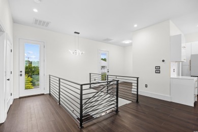 Experience coastal living at its finest in this exceptional and