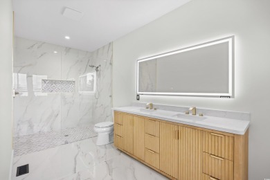 Experience coastal living at its finest in this exceptional and