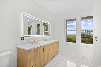 Experience coastal living at its finest in this exceptional and