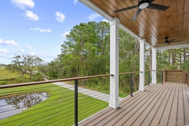 Experience coastal living at its finest in this exceptional and