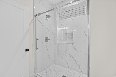 Experience coastal living at its finest in this exceptional and