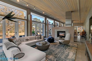 Set on a secluded point along Horn Harbor, this remarkable