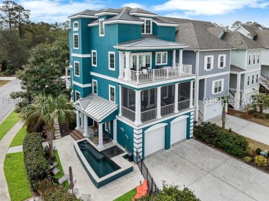 This Custom-Built 5BR/4BA beach retreat is nestled within the