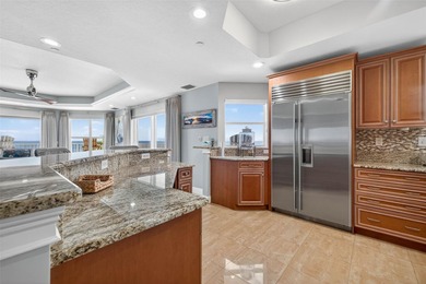 Experience a polished luxury coastal lifestyle in this direct