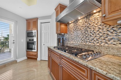 Experience a polished luxury coastal lifestyle in this direct